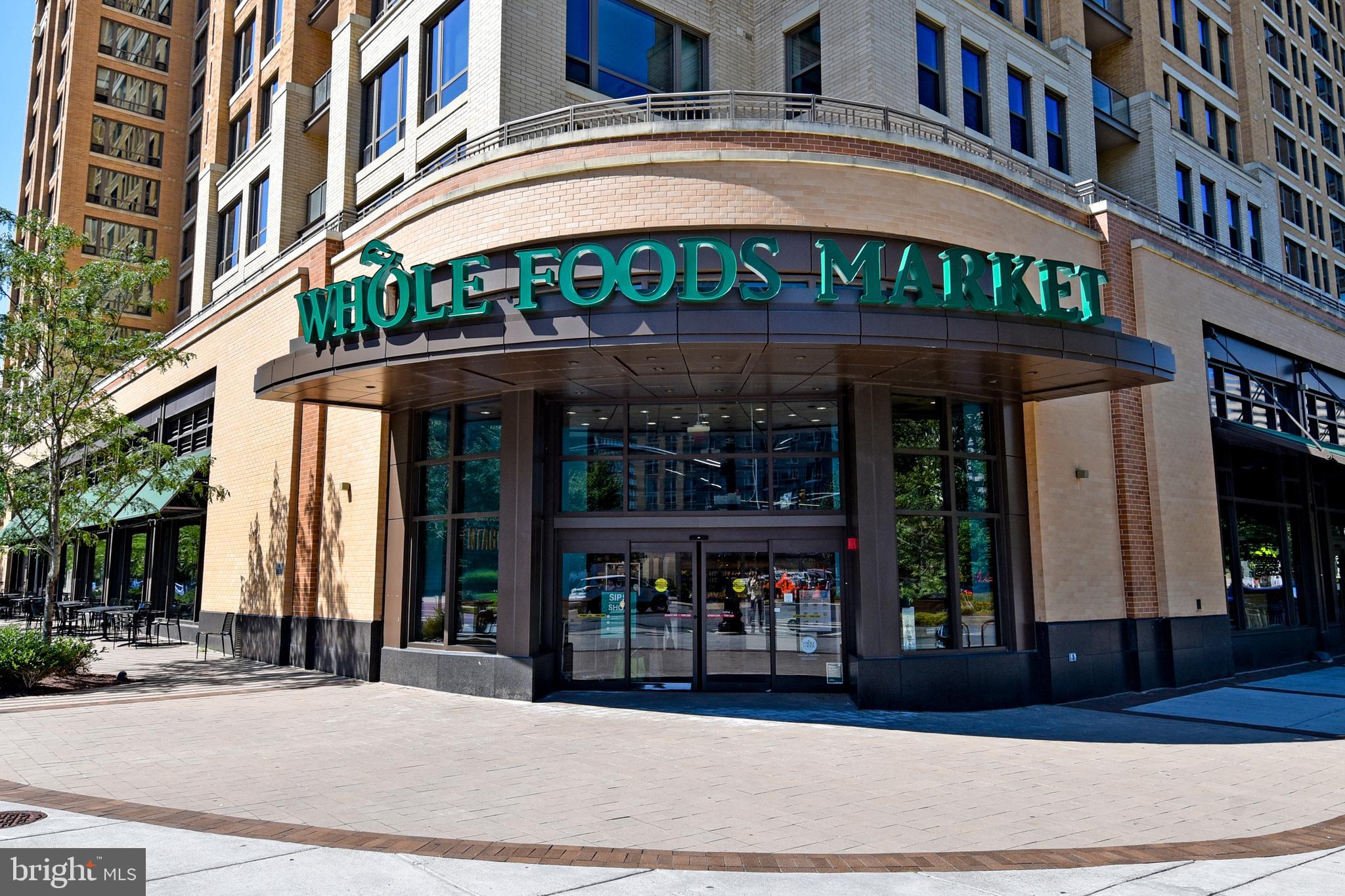 1301 South Arlington Ridge Road, Unit 110 Arlington, VA 22202 - Photo 40 of 45 a front view of a building with a entrance