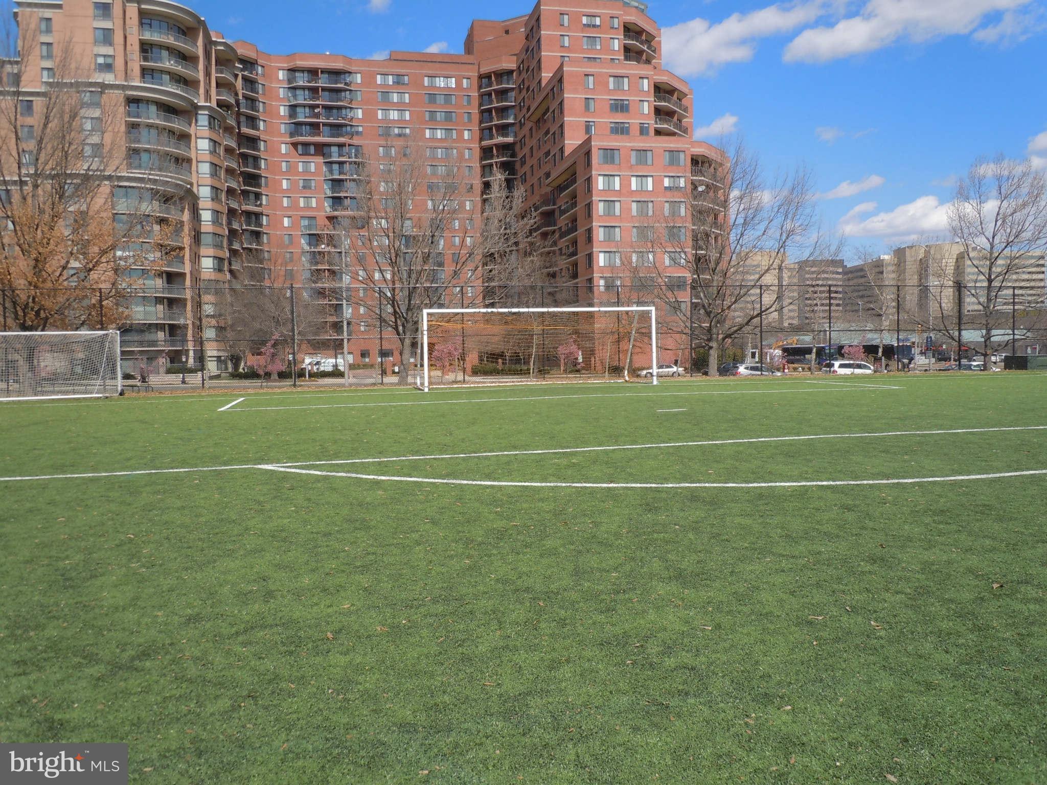 1301 South Arlington Ridge Road, Unit 110 Arlington, VA 22202 - Photo 42 of 45 a view of a tall building