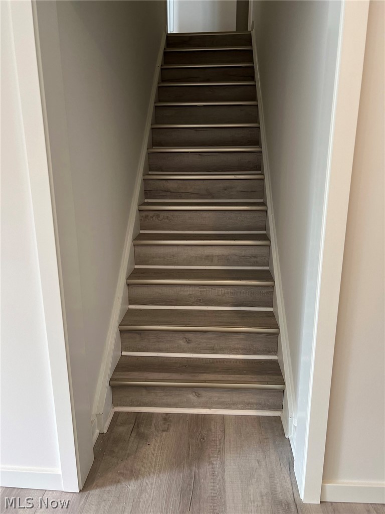 550 Johnson Road Wadsworth, OH 44281 - Photo 24 of 40 Staircase featuring hardwood / wood-style floors