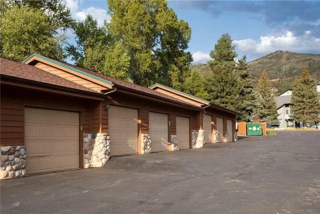 a view of a house with a garage