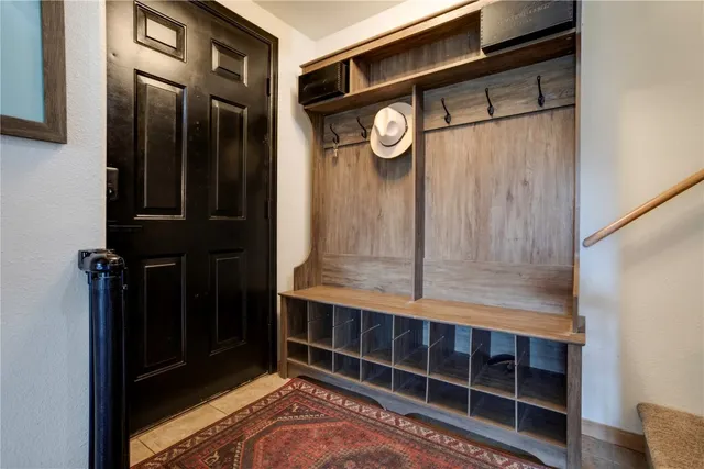 a view of a door and a window