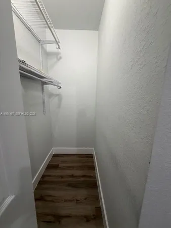 a bathroom with a toilet a sink and bathtub