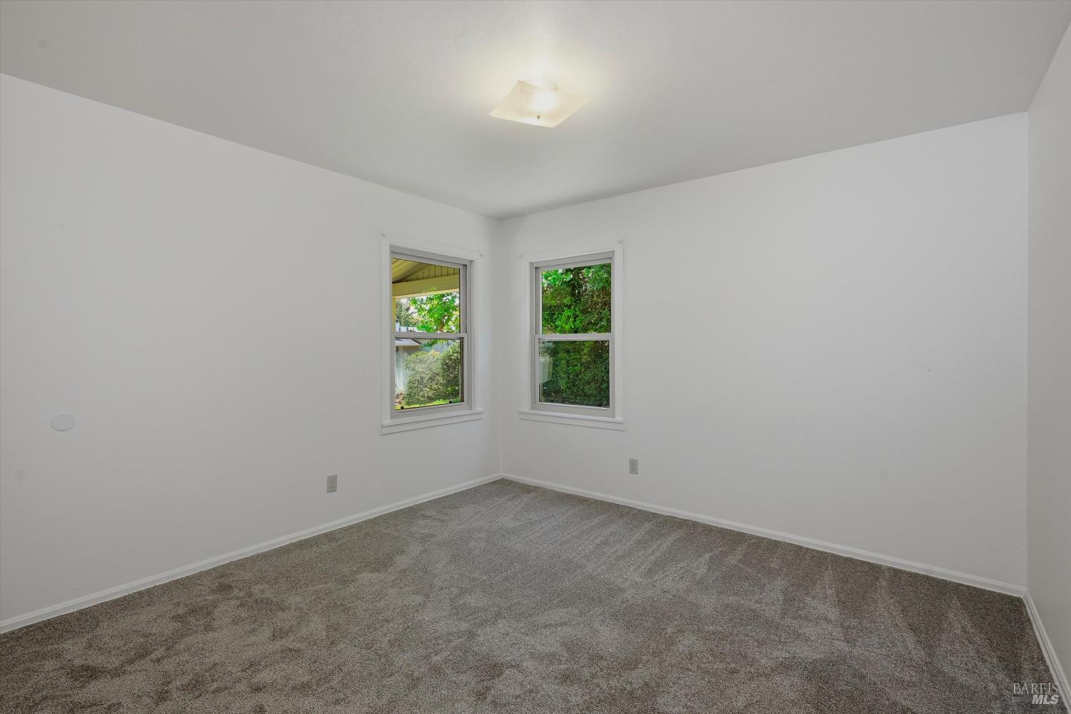 4941 Hansen Drive Santa Rosa, CA 95409 - Photo 17 of 35 3rd bedroom in front corner has nice view of lawn