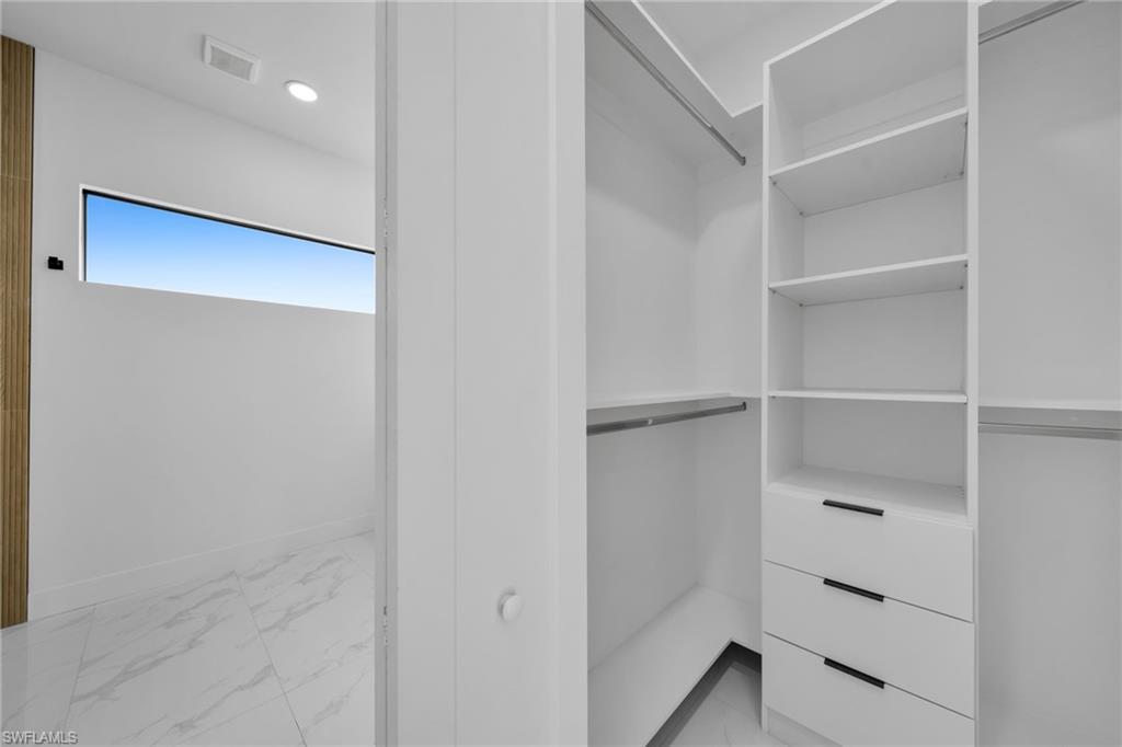 1138 Garibaldi Street East Lehigh Acres, FL 33974 - Photo 27 of 36 Spacious closet with light marble finish floors