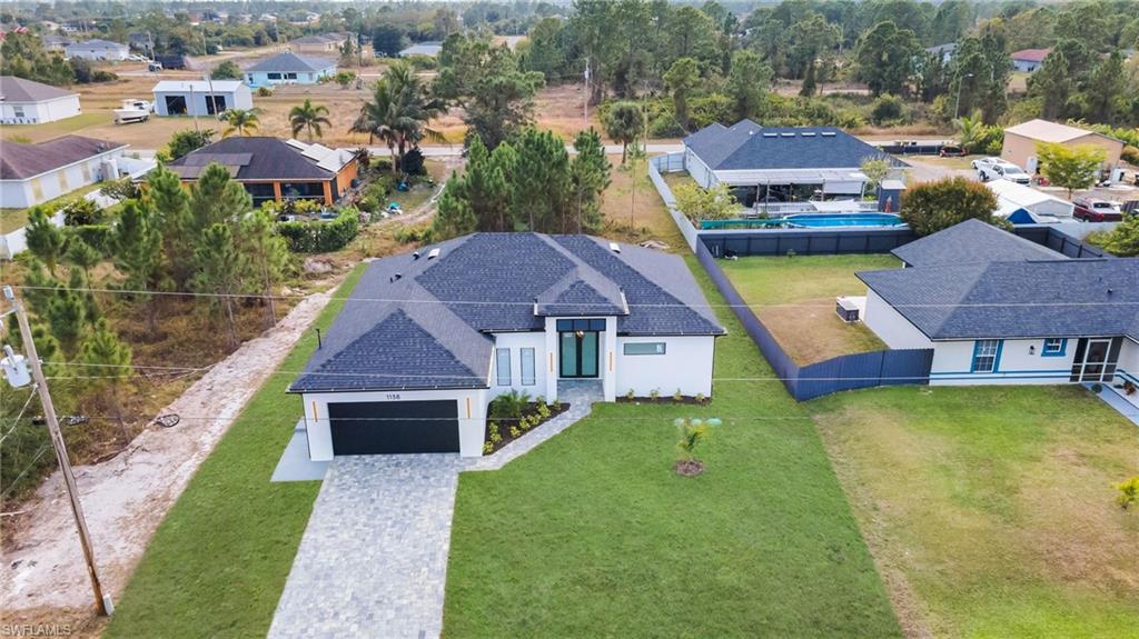1138 Garibaldi Street East Lehigh Acres, FL 33974 - Photo 6 of 36 Aerial view of residential area