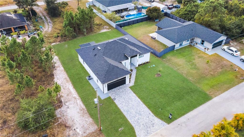 1138 Garibaldi Street East Lehigh Acres, FL 33974 - Photo 7 of 36 Aerial view of property and surrounding area