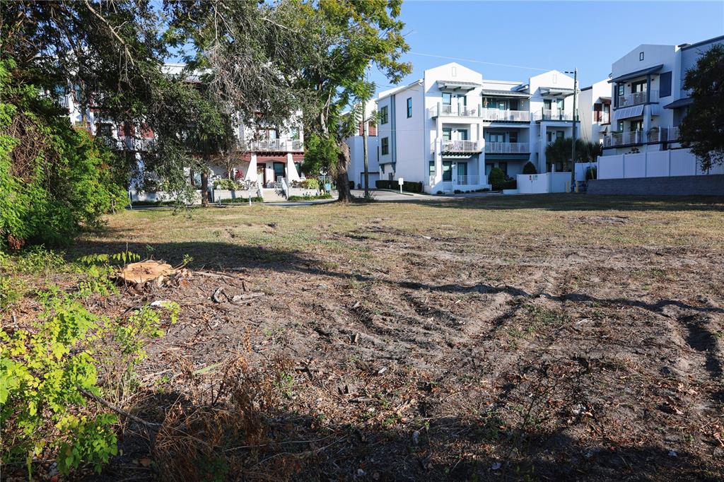 952 Howard Avenue Dunedin, FL 34698 - Photo 16 of 24 a view of residential houses with yard and trees