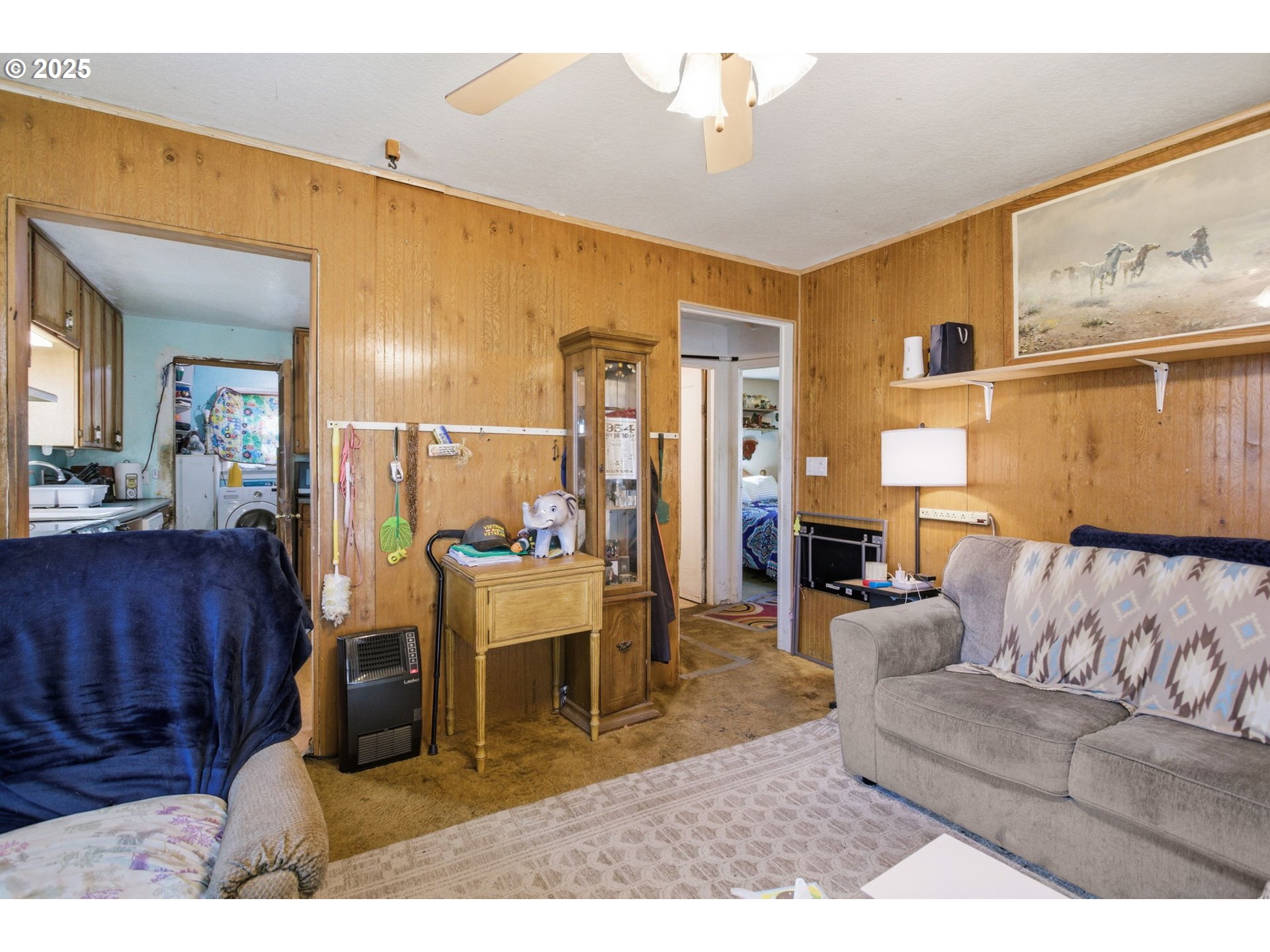 176 South 38th Street Springfield, OR 97478 - Photo 12 of 35 a living room with furniture and a dining table