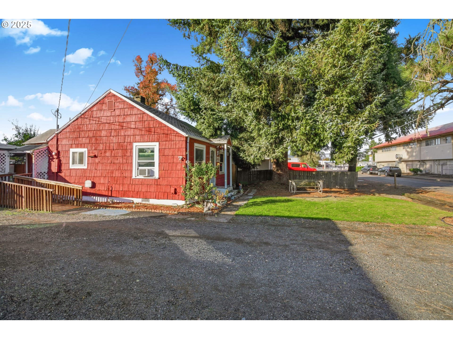 176 South 38th Street Springfield, OR 97478 - Photo 4 of 35 a view of a house with a yard and tree s