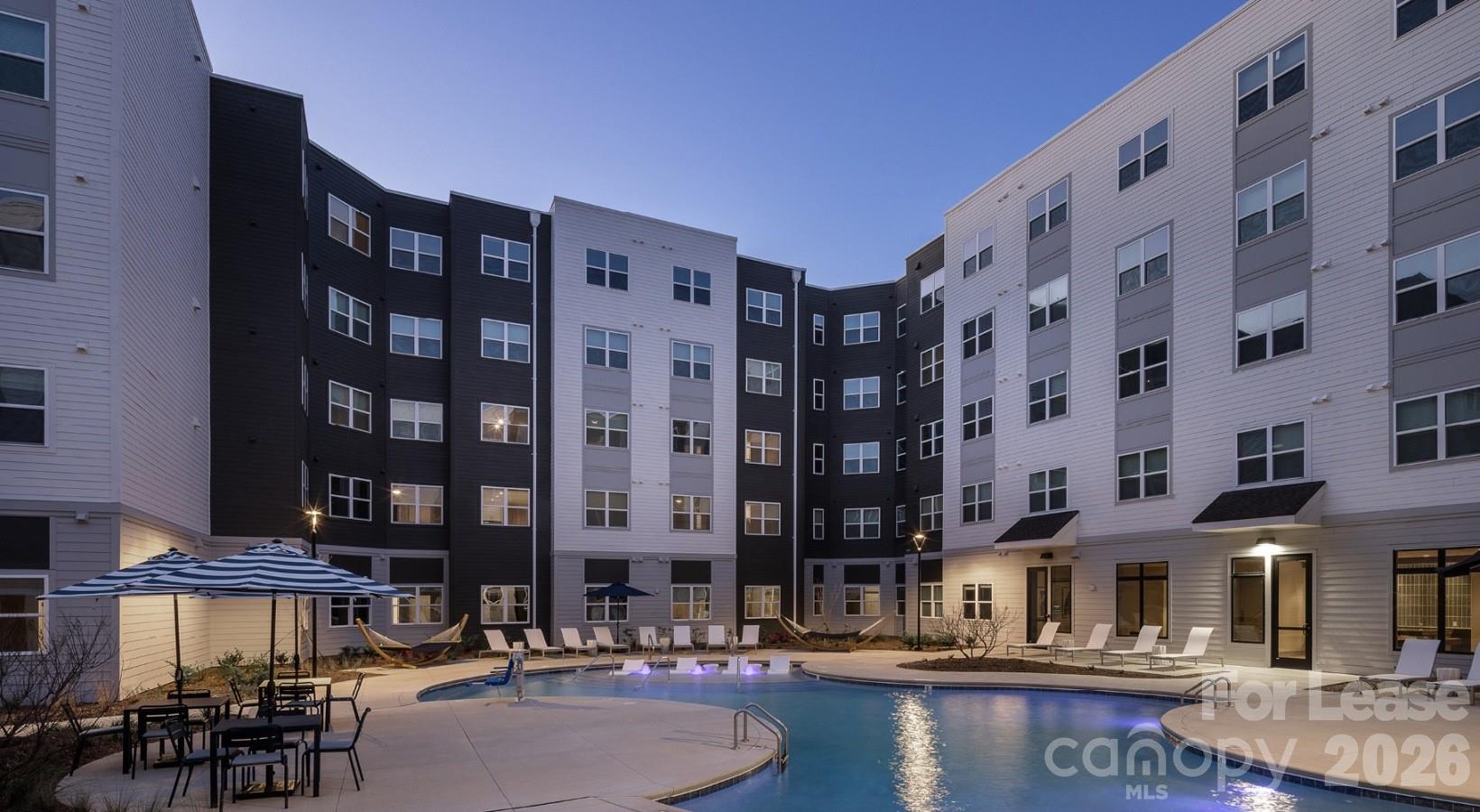 8424 North Tryon Street, Unit A2 Charlotte, NC 28262 - Photo 3 of 25 a view of a building with street view