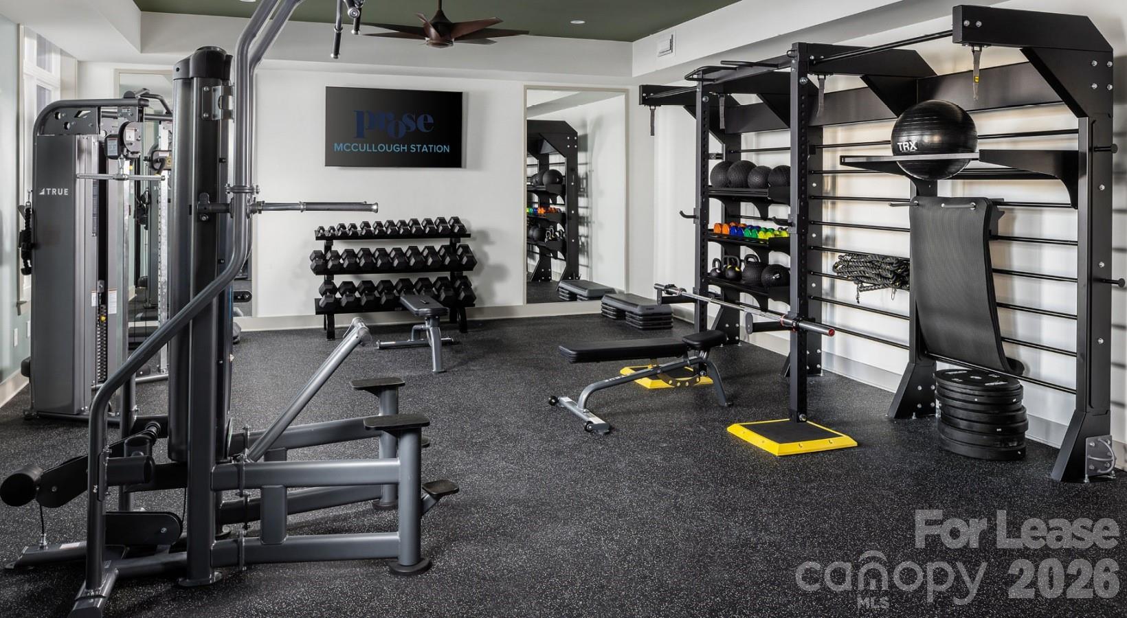 8424 North Tryon Street, Unit A2 Charlotte, NC 28262 - Photo 8 of 25 a view of a room with gym equipment