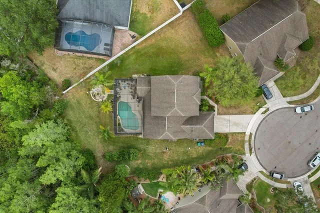 a kitchen with stainless steel appliances granite countertop a stove a sink dishwasher and a refrigerator