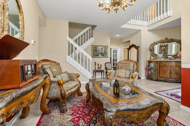 a living room with furniture and a rug