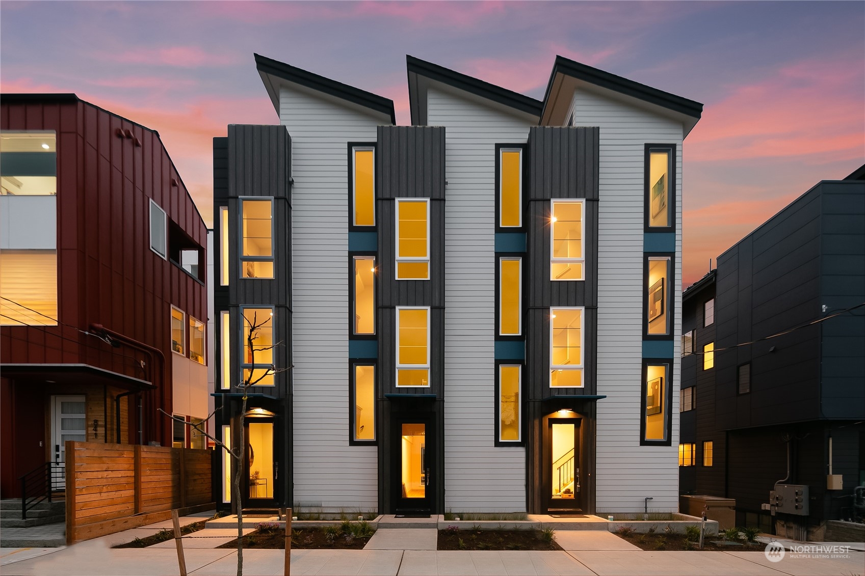 a front view of building with multiple windows