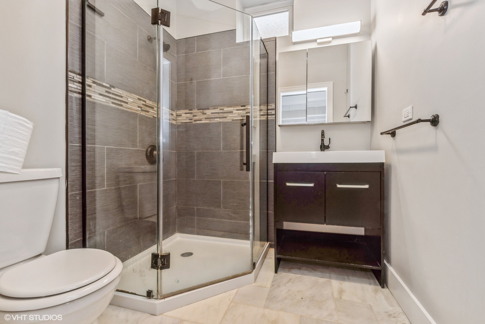 2622 West Crystal Street, Unit 2 Chicago, IL 60622 - Photo 8 of 10 a bathroom with a toilet and a shower