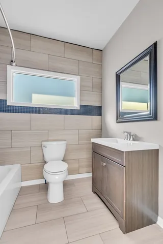 a bathroom with a bathtub