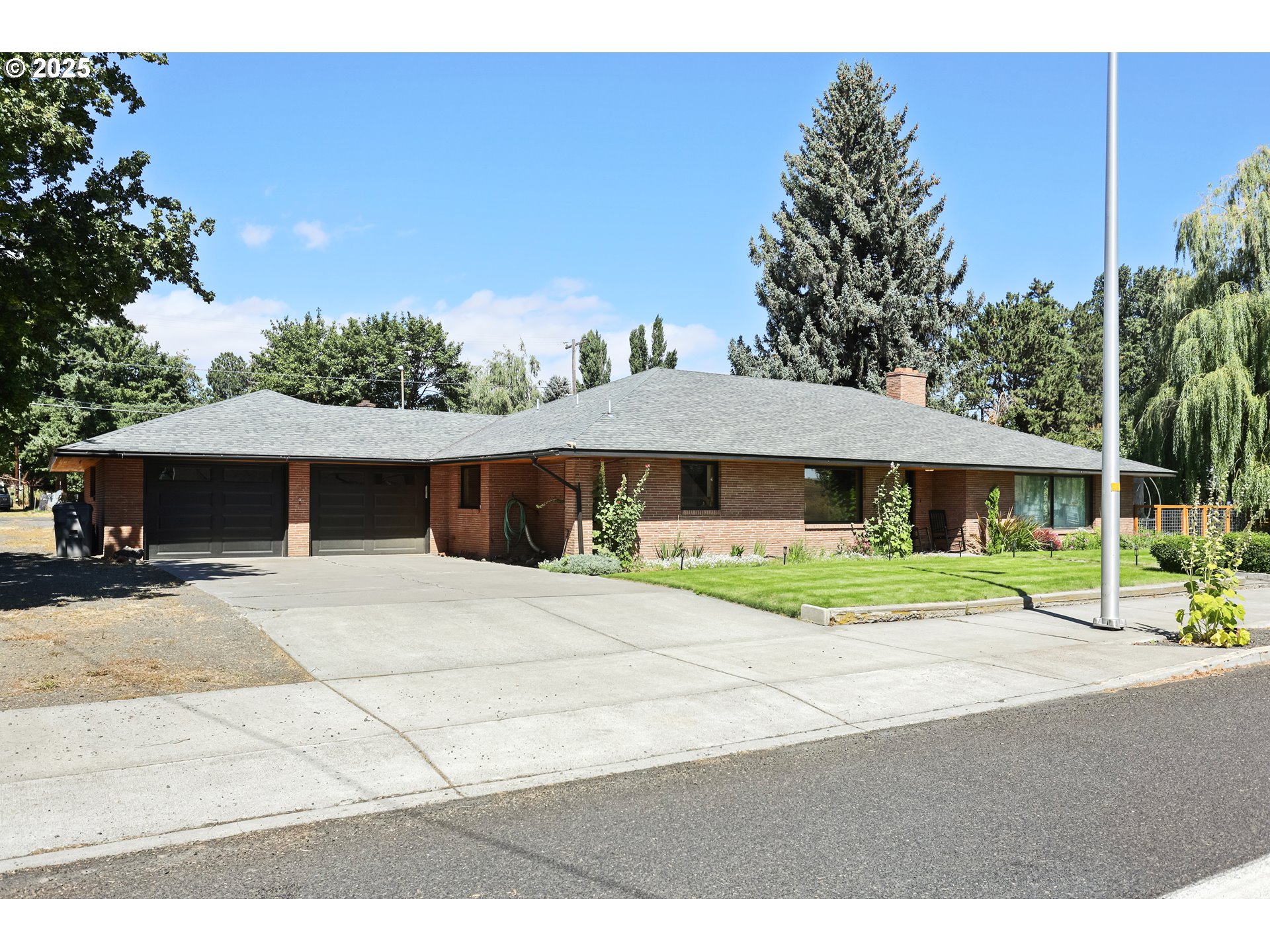 236 N Mill Grass Valley, OR 97029 - Photo 1 of 45 a front view of a house with a yard