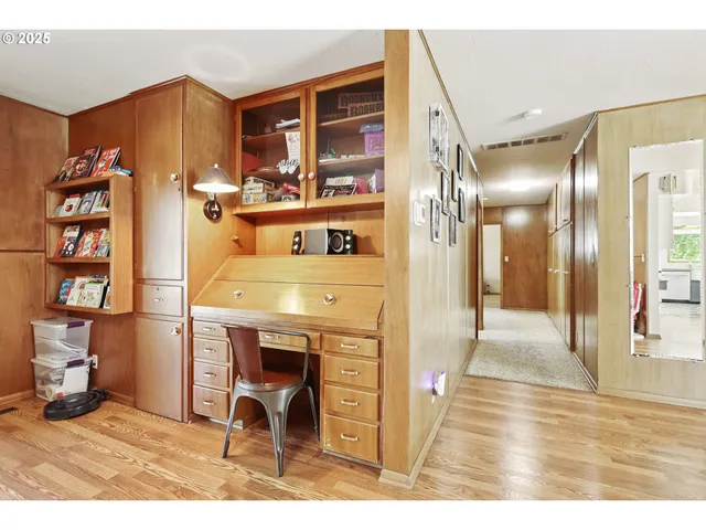 a view of a livingroom with furniture and wooden floor
