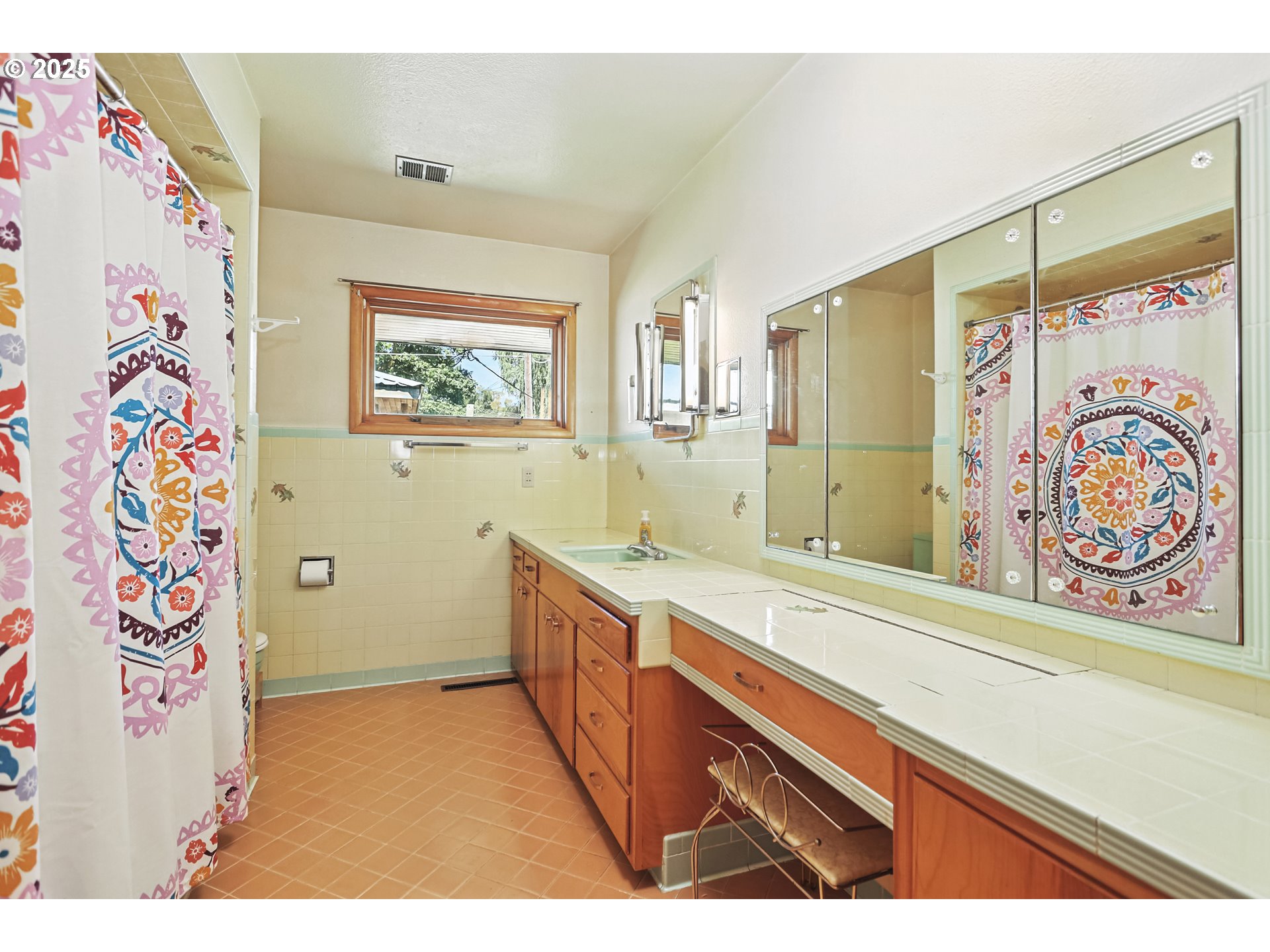 236 N Mill Grass Valley, OR 97029 - Photo 27 of 45 a bathroom with a sink a large mirror and a shower