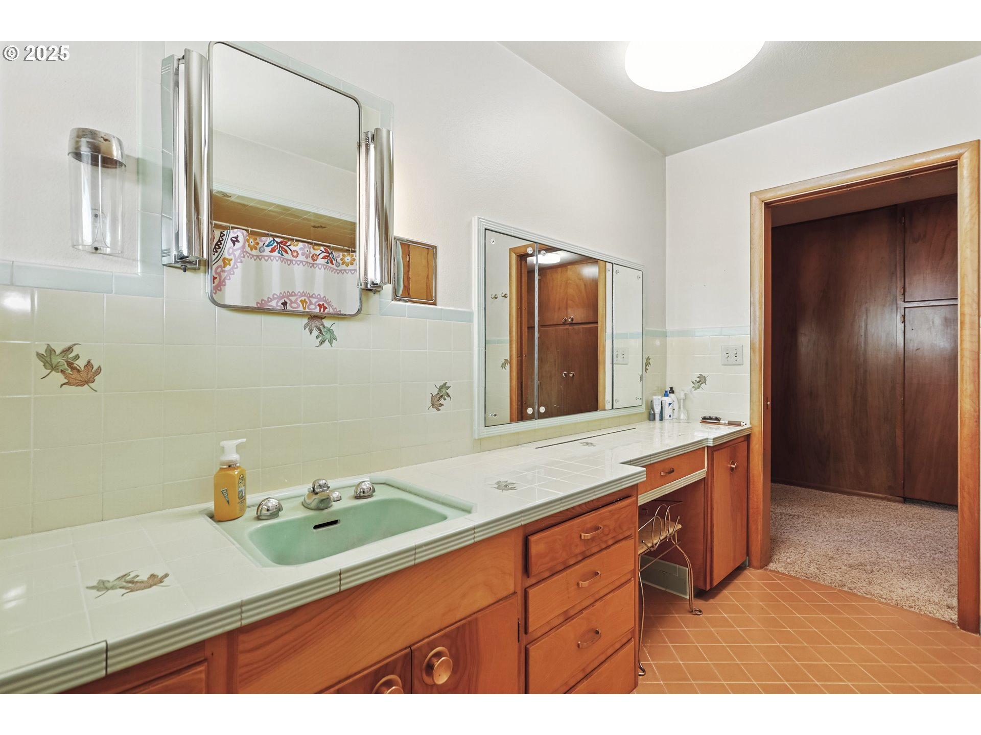 236 N Mill Grass Valley, OR 97029 - Photo 28 of 45 a bathroom with a sink and a mirror
