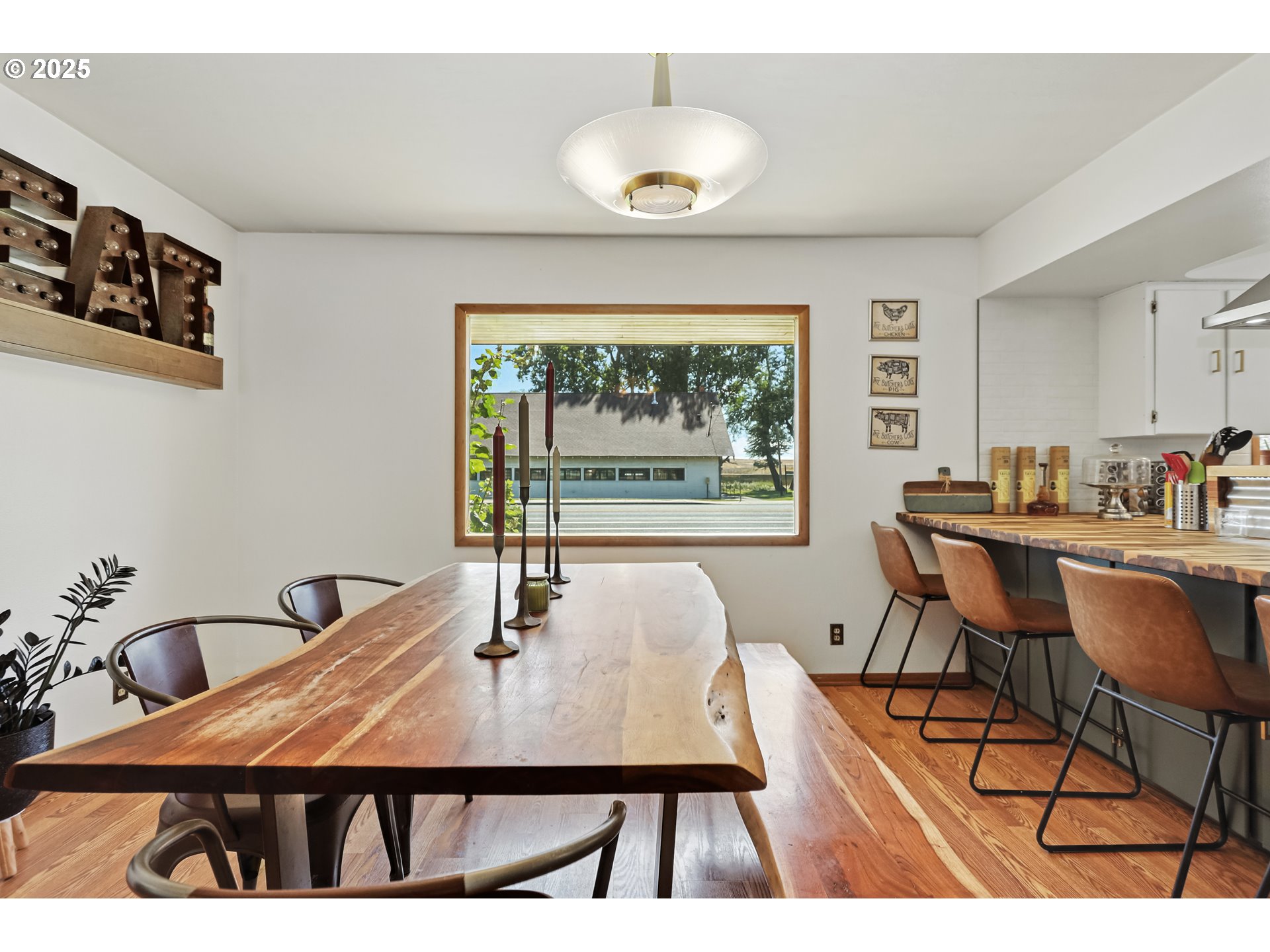 236 N Mill Grass Valley, OR 97029 - Photo 10 of 45 a view of a dining room with furniture window and outside view