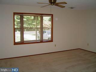 1830 Almonesson Road Woodbury, NJ 08096 - Photo 3 of 6 an empty room with a window