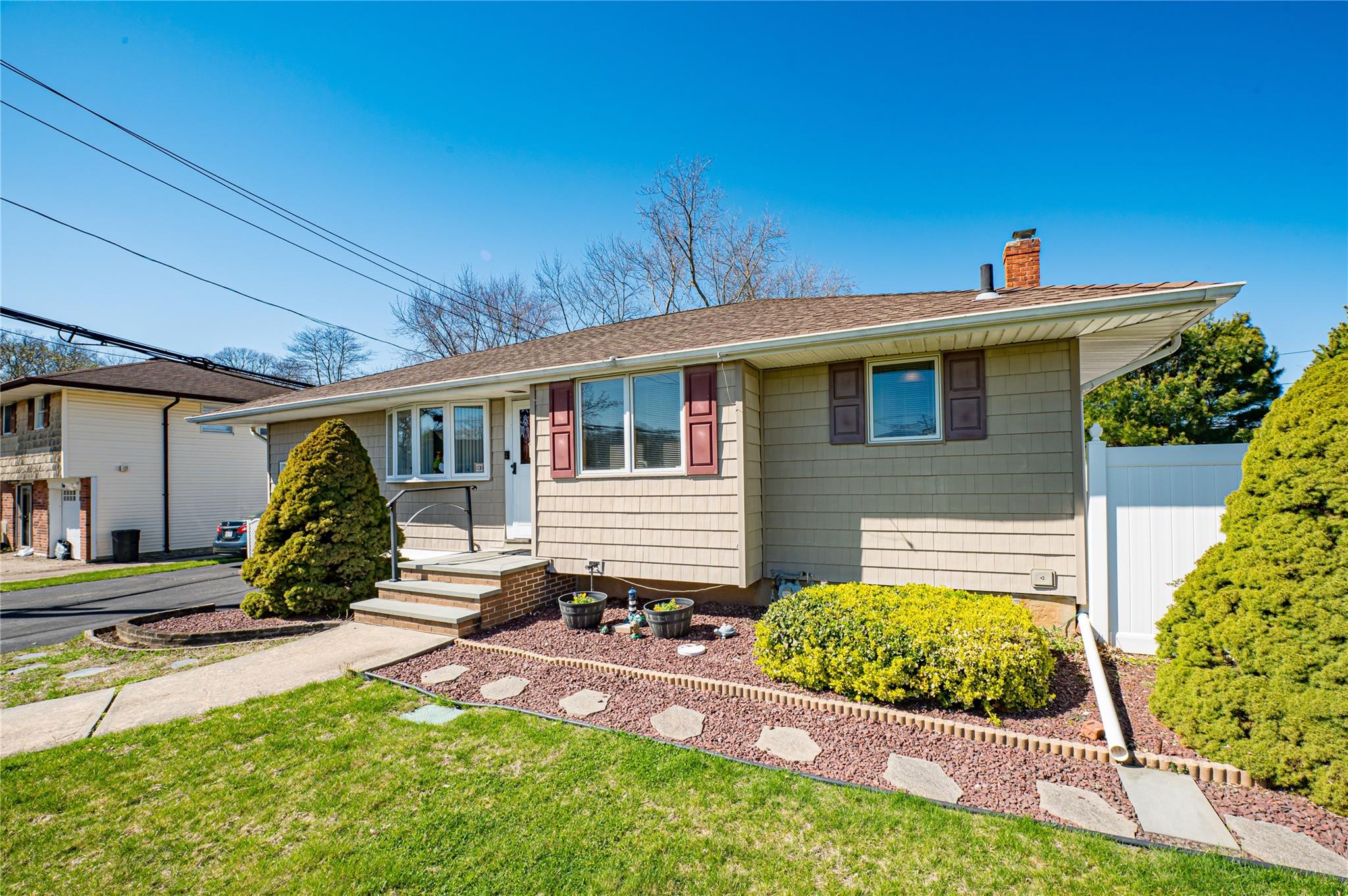 3 Baylor Drive Smithtown, NY 11787 - Photo 1 of 1 Expanded Ranch-style house with updated roof and siding