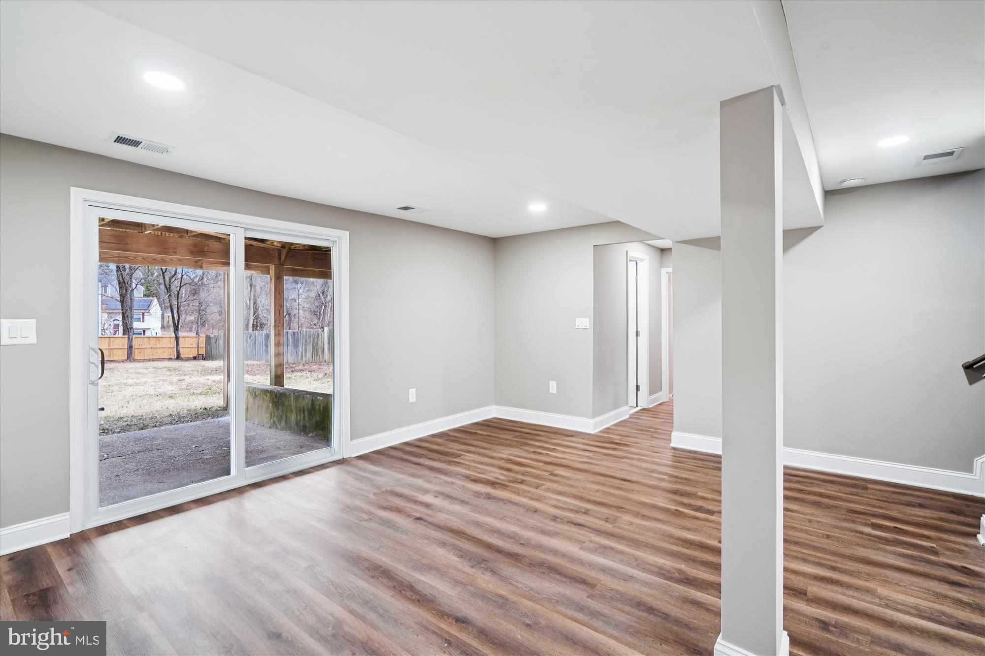 6473 Anderson Avenue Hanover, MD 21076 - Photo 16 of 27 a view of an empty room with glass door
