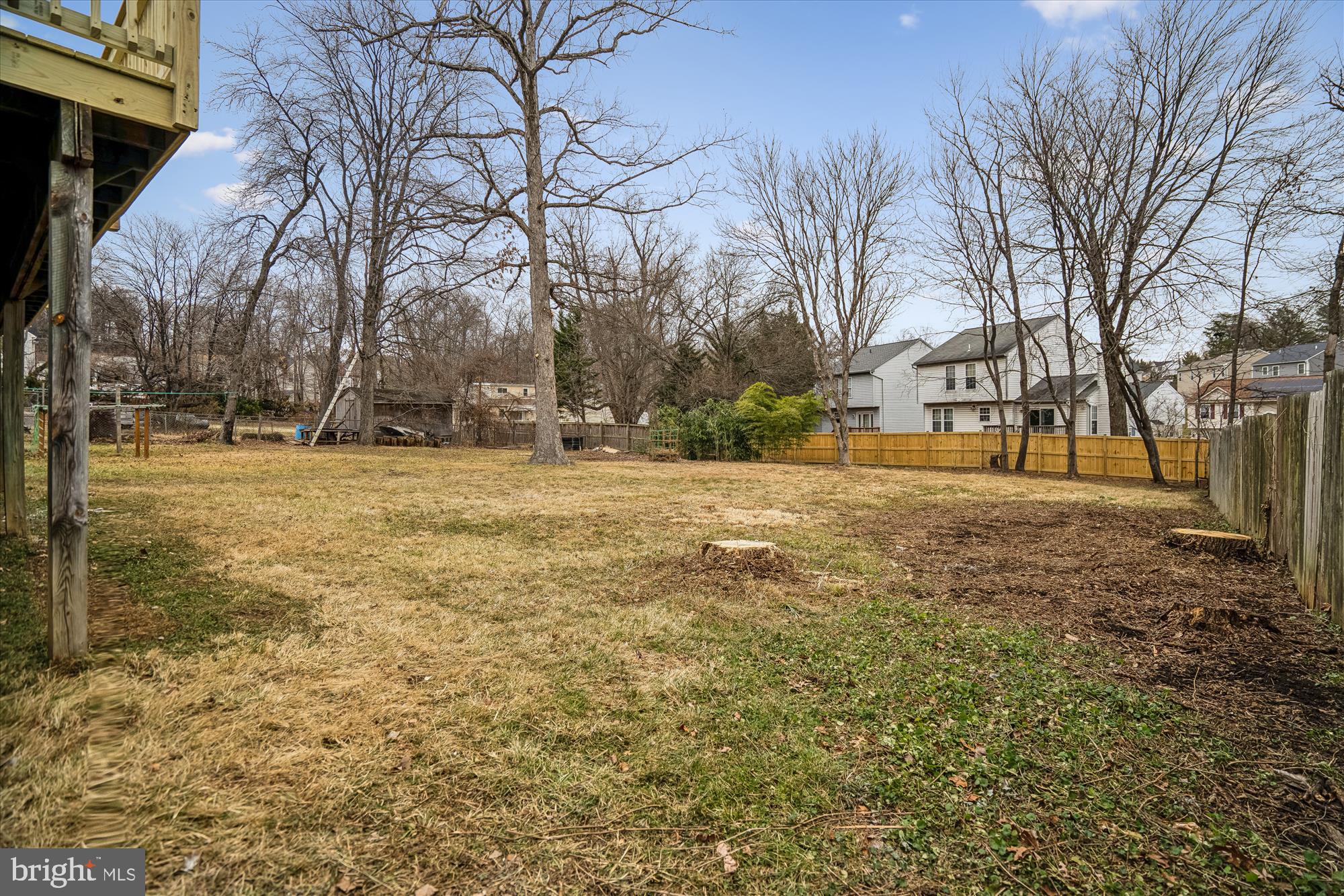 6473 Anderson Avenue Hanover, MD 21076 - Photo 3 of 27 a view of road with large trees