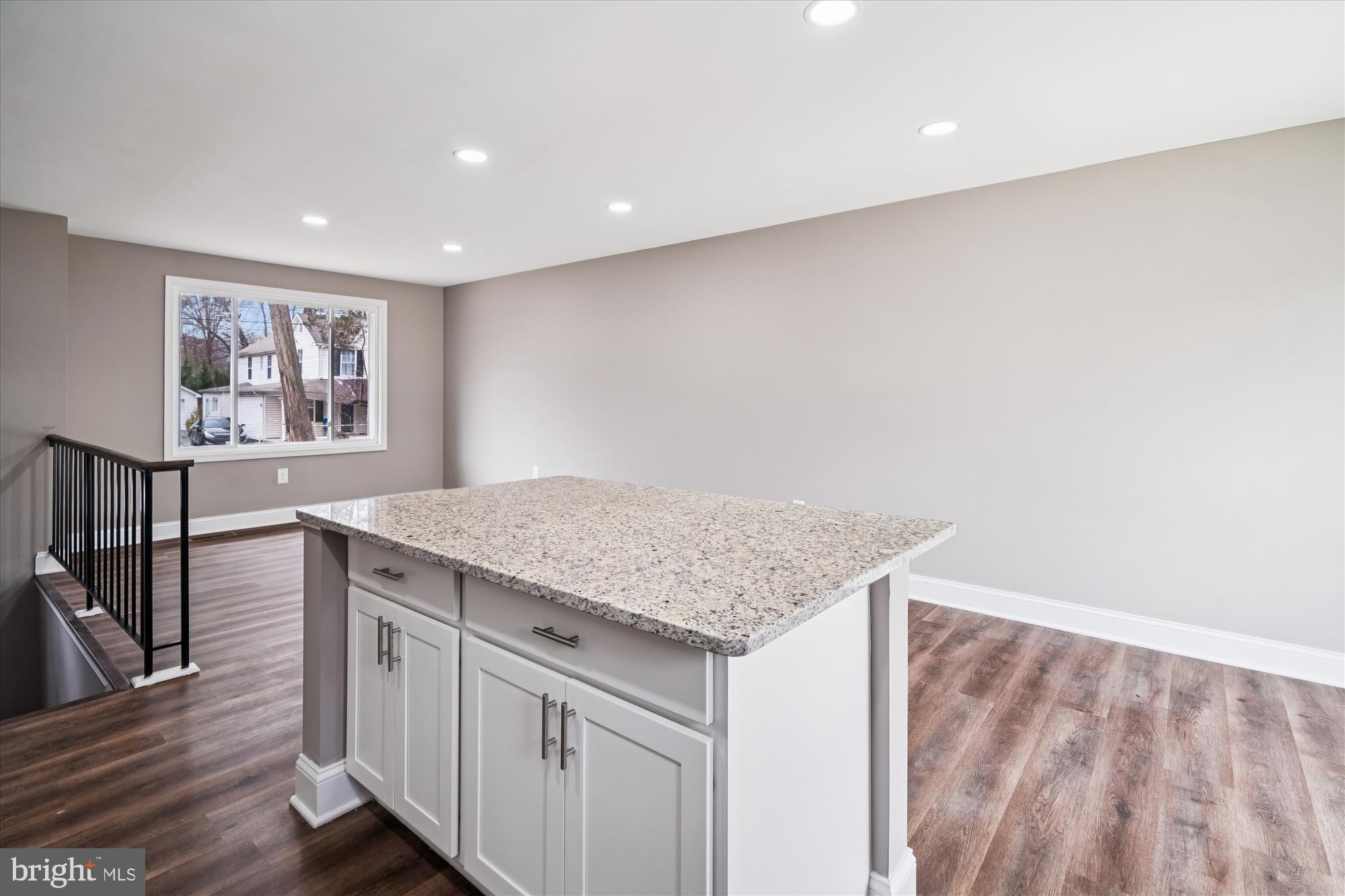 6473 Anderson Avenue Hanover, MD 21076 - Photo 7 of 27 a kitchen with a sink cabinets and wooden floor