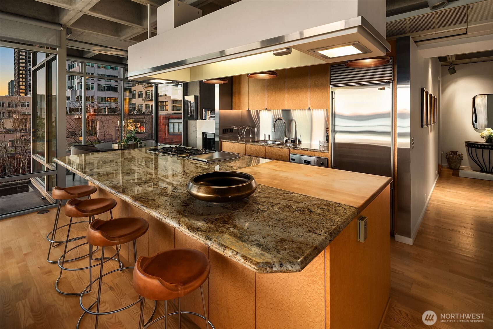 87 Virginia Street, Unit 8 Seattle, WA 98101 - Photo 12 of 34 a kitchen with a table chairs and a stove