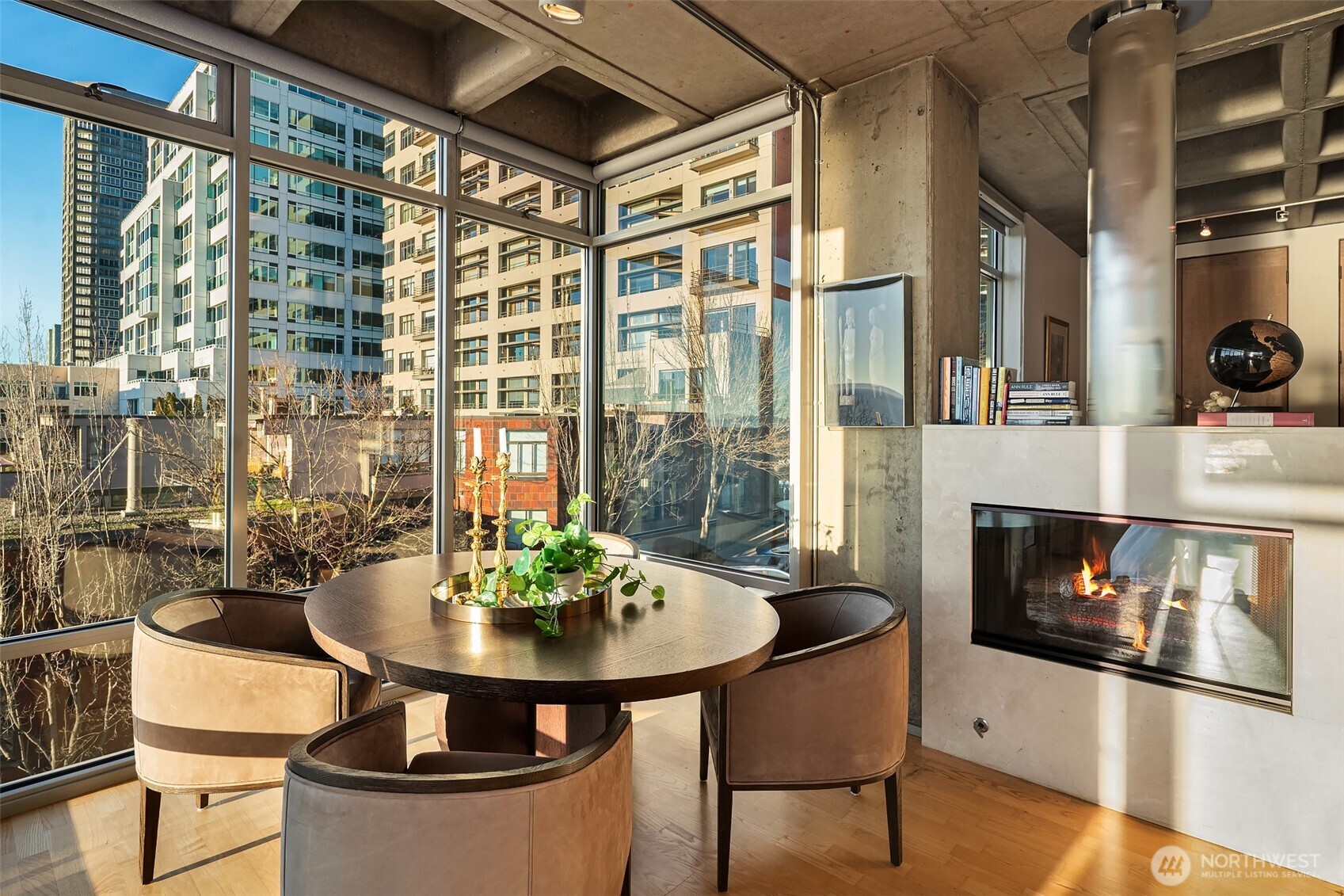 87 Virginia Street, Unit 8 Seattle, WA 98101 - Photo 18 of 34 a living room with a table and a fireplace
