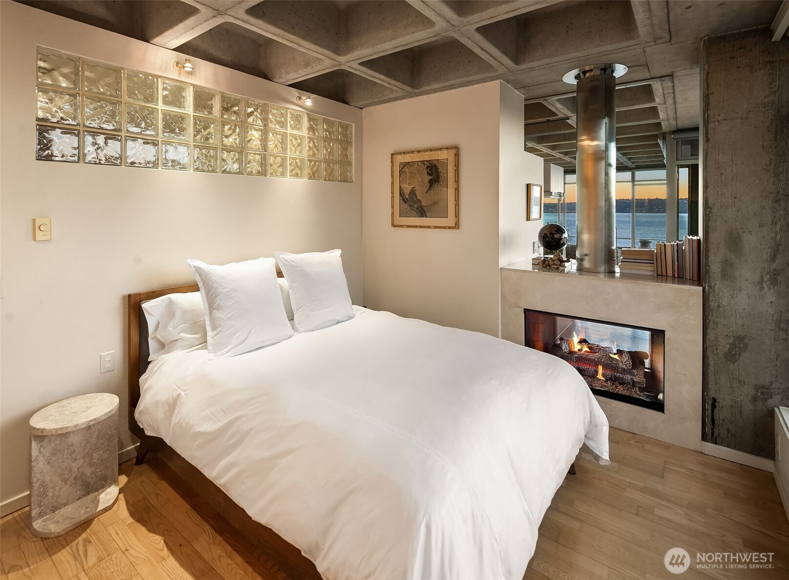 87 Virginia Street, Unit 8 Seattle, WA 98101 - Photo 20 of 34 a bedroom with a bed and a mirror