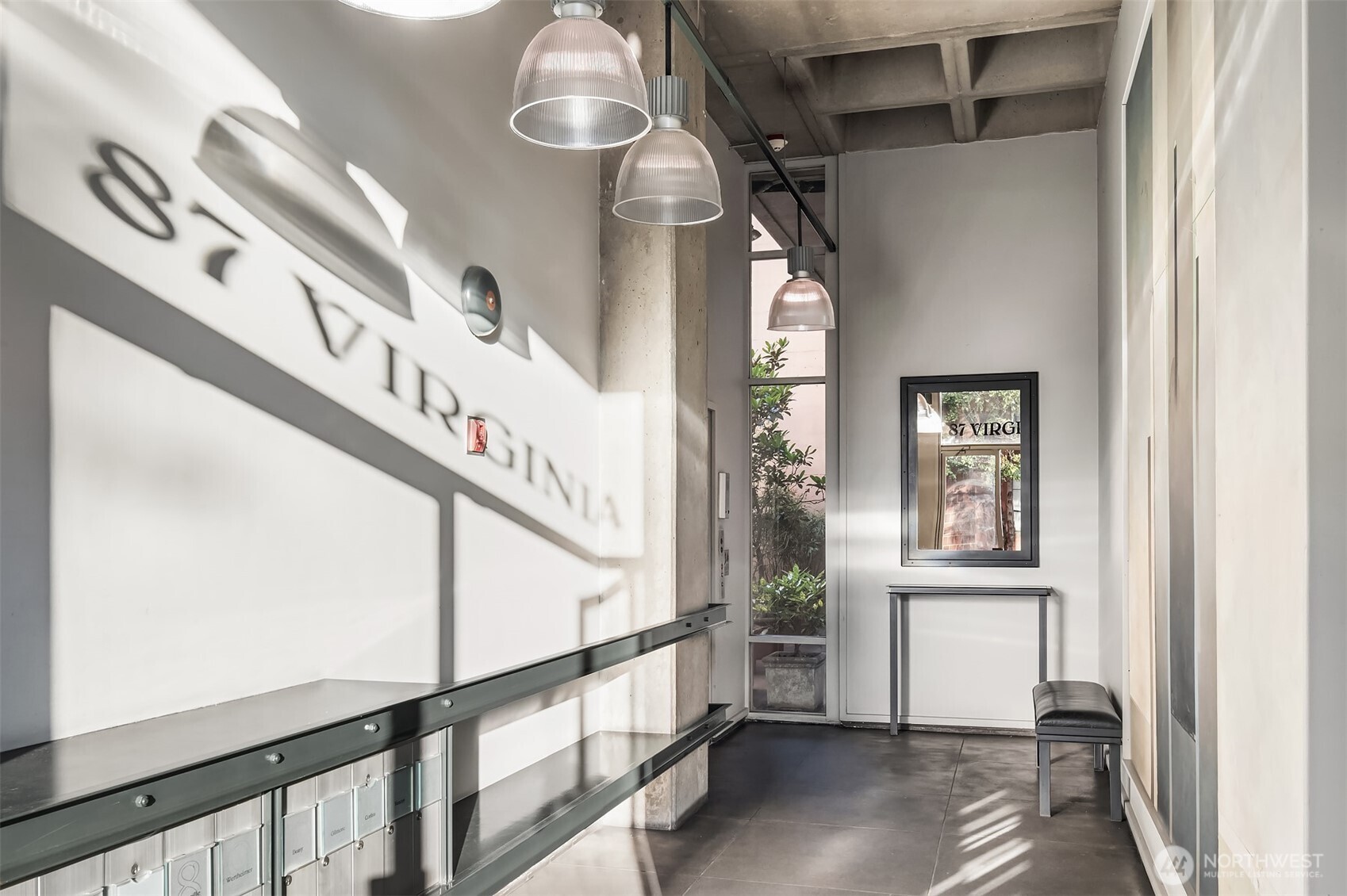 87 Virginia Street, Unit 8 Seattle, WA 98101 - Photo 25 of 34 a view of an entryway with wooden floor