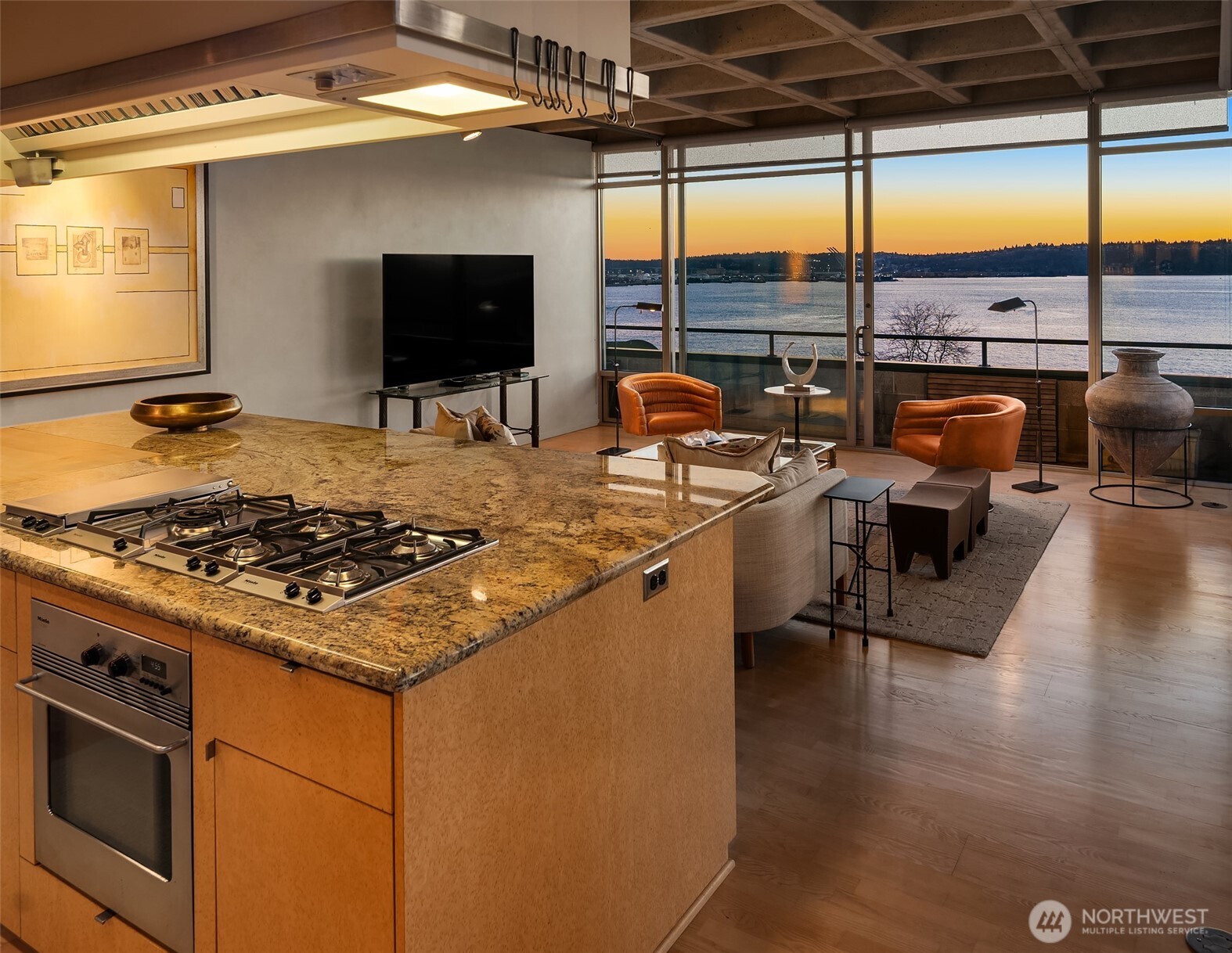 87 Virginia Street, Unit 8 Seattle, WA 98101 - Photo 10 of 34 a kitchen with stainless steel appliances granite countertop a stove and a sink