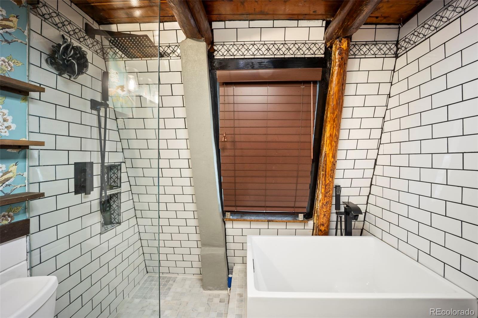 25874 Mosier Street Conifer, CO 80433 - Photo 13 of 45 a bathroom with a shower