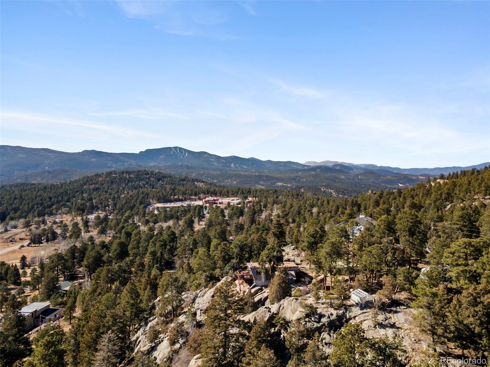 25874 Mosier Street Conifer, CO 80433 - Photo 42 of 45 an aerial view of residential house and green space
