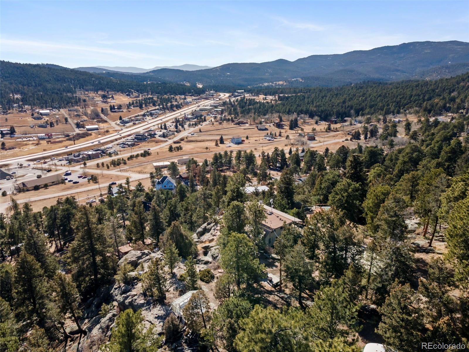 25874 Mosier Street Conifer, CO 80433 - Photo 43 of 45 an aerial view of residential house and green space