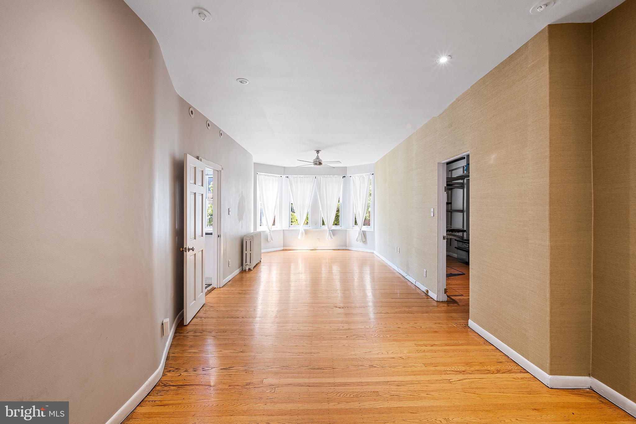 231 Pine Street, Unit 2 Philadelphia, PA 19106 - Photo 11 of 23 a view of a hallway view with wooden floor and staircase