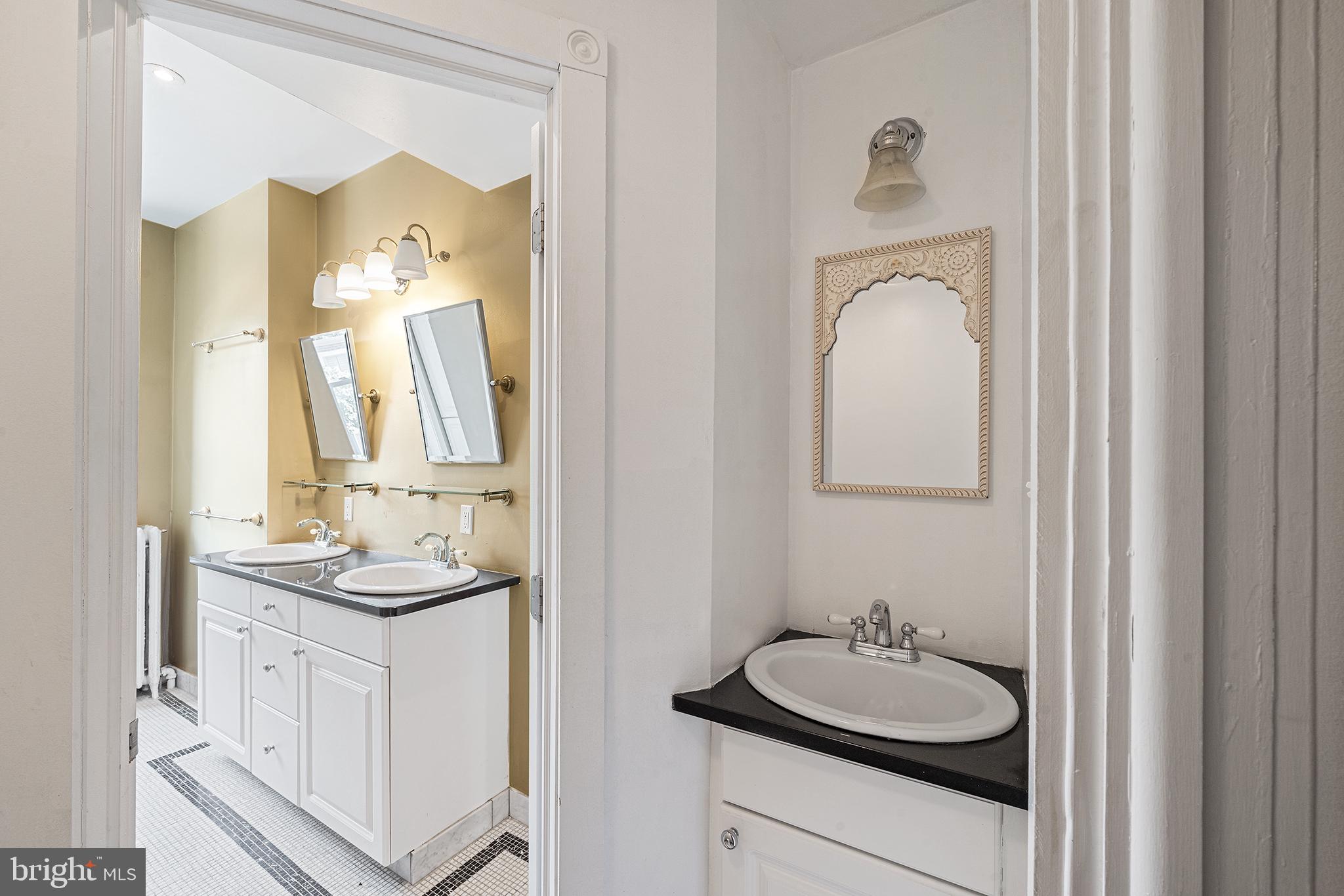 231 Pine Street, Unit 2 Philadelphia, PA 19106 - Photo 15 of 23 a bathroom with a sink and a mirror with toilet