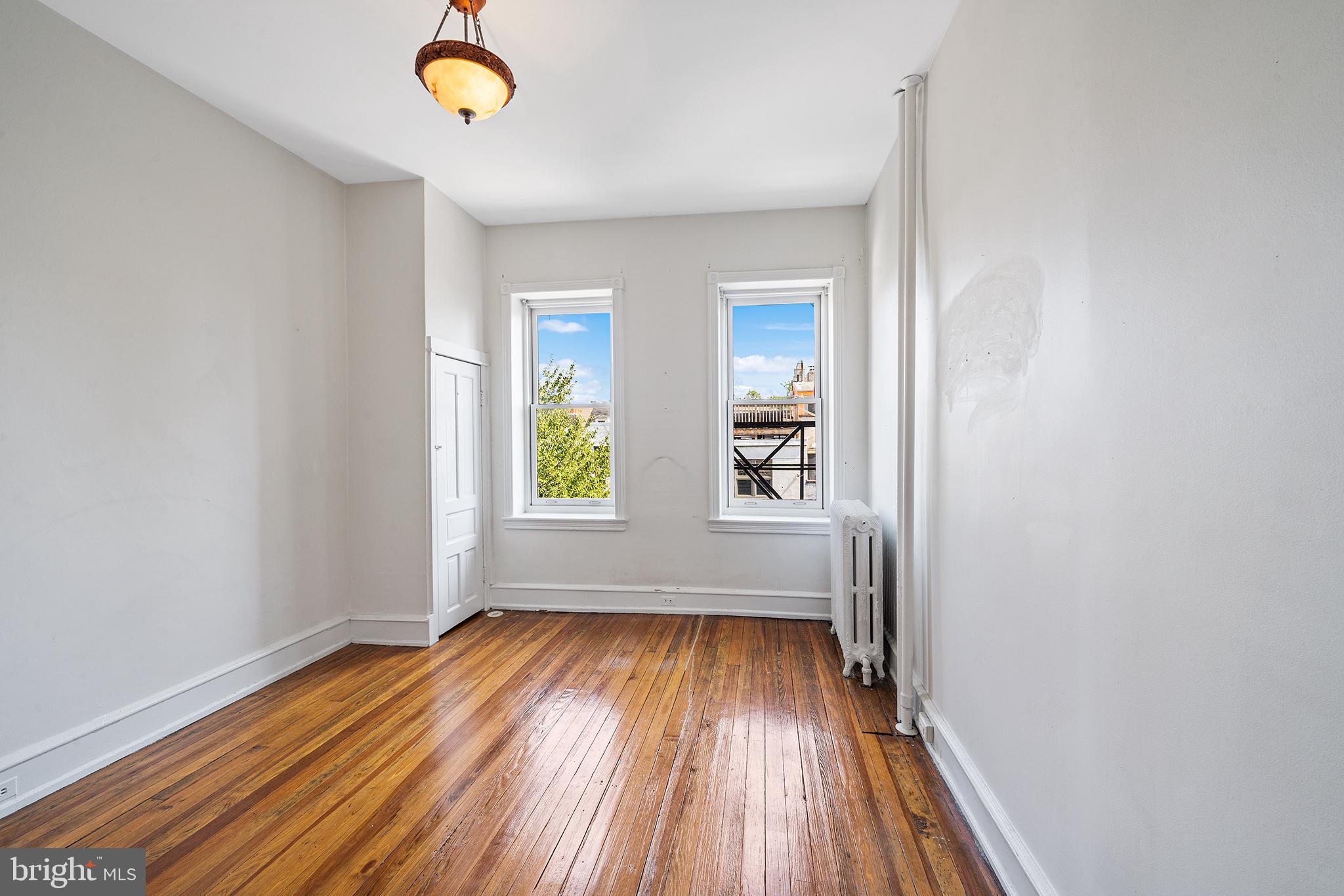 231 Pine Street, Unit 2 Philadelphia, PA 19106 - Photo 18 of 23 a view of room with window and wooden floor