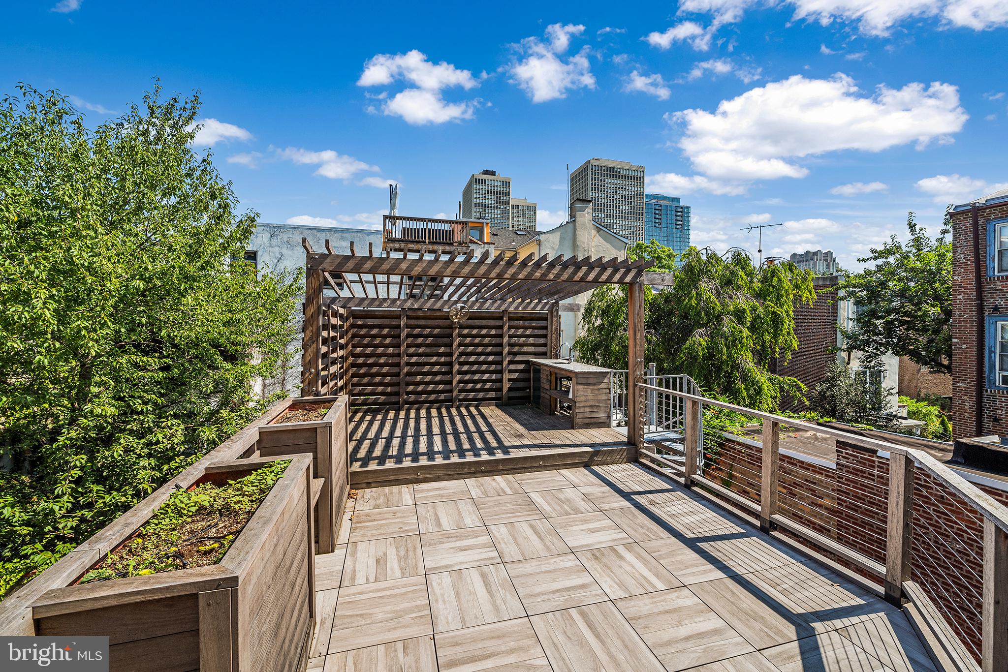 231 Pine Street, Unit 2 Philadelphia, PA 19106 - Photo 5 of 23 a view of terrace with seating space and trees