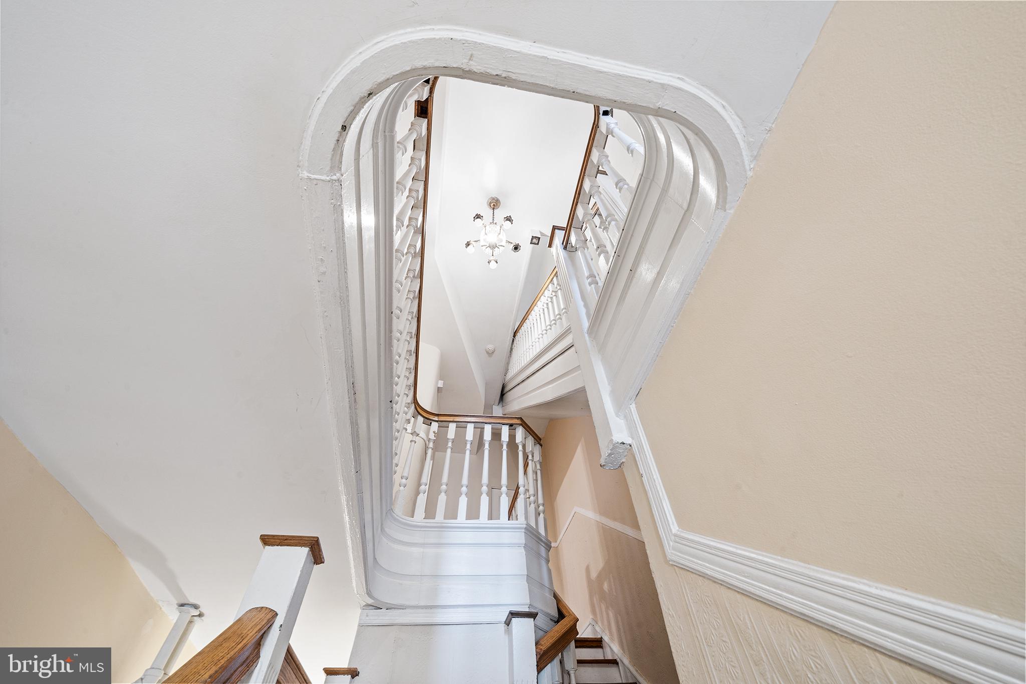231 Pine Street, Unit 2 Philadelphia, PA 19106 - Photo 6 of 23 a view of staircase with wooden floor