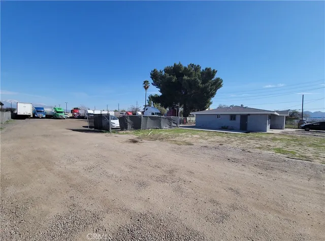 a front view of house with a yard