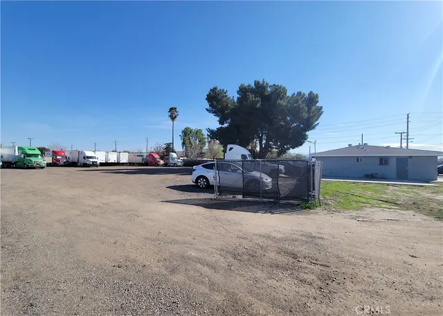 a view of a street with cars