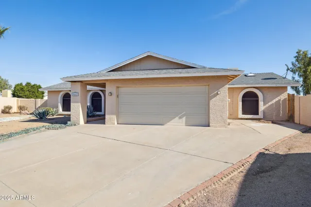 a view of a house with a garage