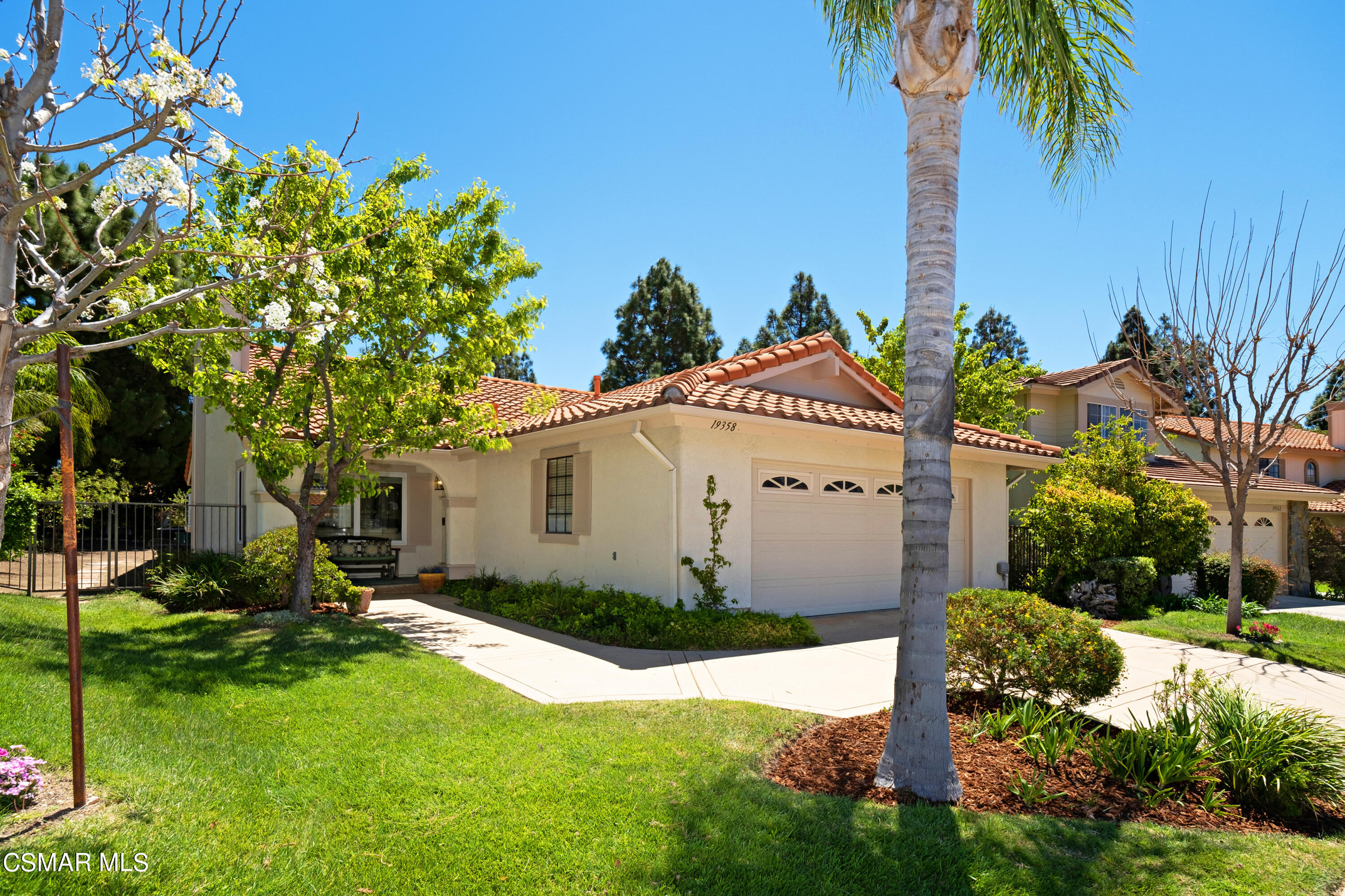 19358 Crystal Ridge Lane Porter Ranch, CA 91326 - Photo 2 of 37 a view of backyard with palm trees