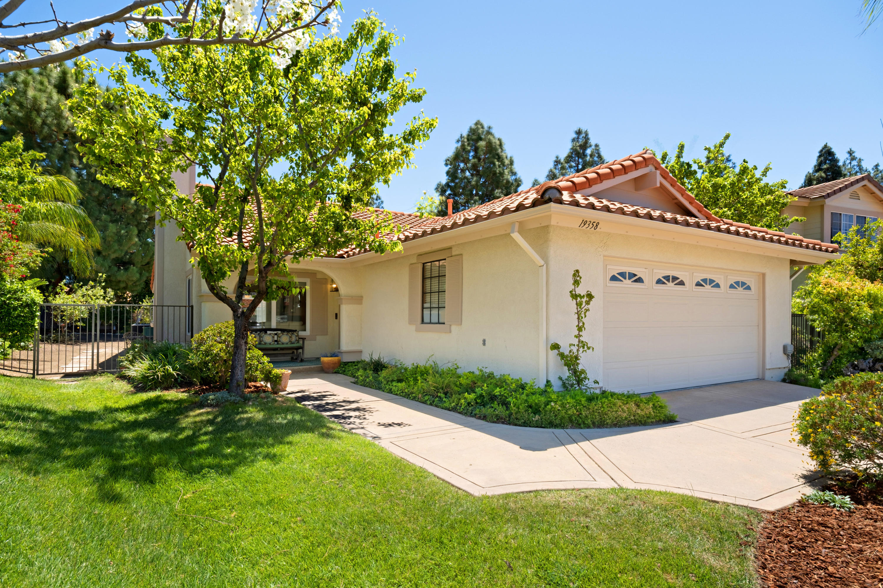 19358 Crystal Ridge Lane Porter Ranch, CA 91326 - Photo 3 of 37 a view of a house with a yard