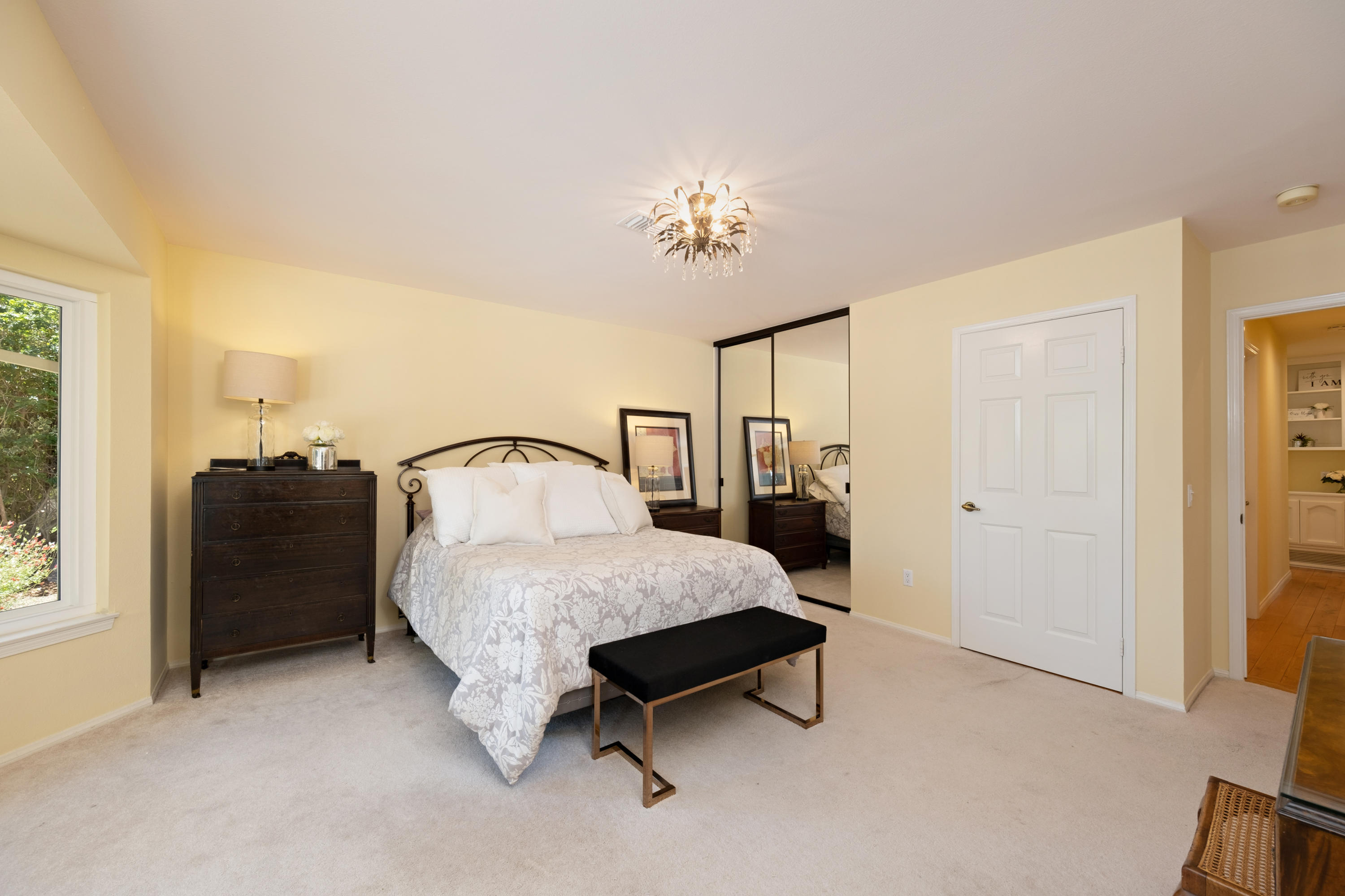 19358 Crystal Ridge Lane Porter Ranch, CA 91326 - Photo 24 of 37 a spacious bedroom with a bed and a window