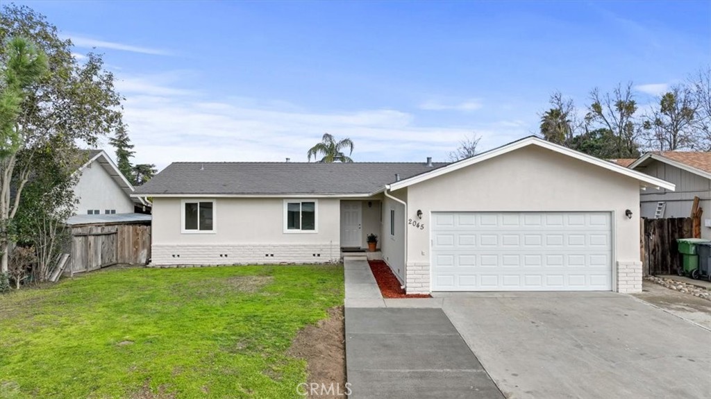 2045 Roth Court Turlock, CA 95380 - Photo 1 of 1 a view of a house with a yard
